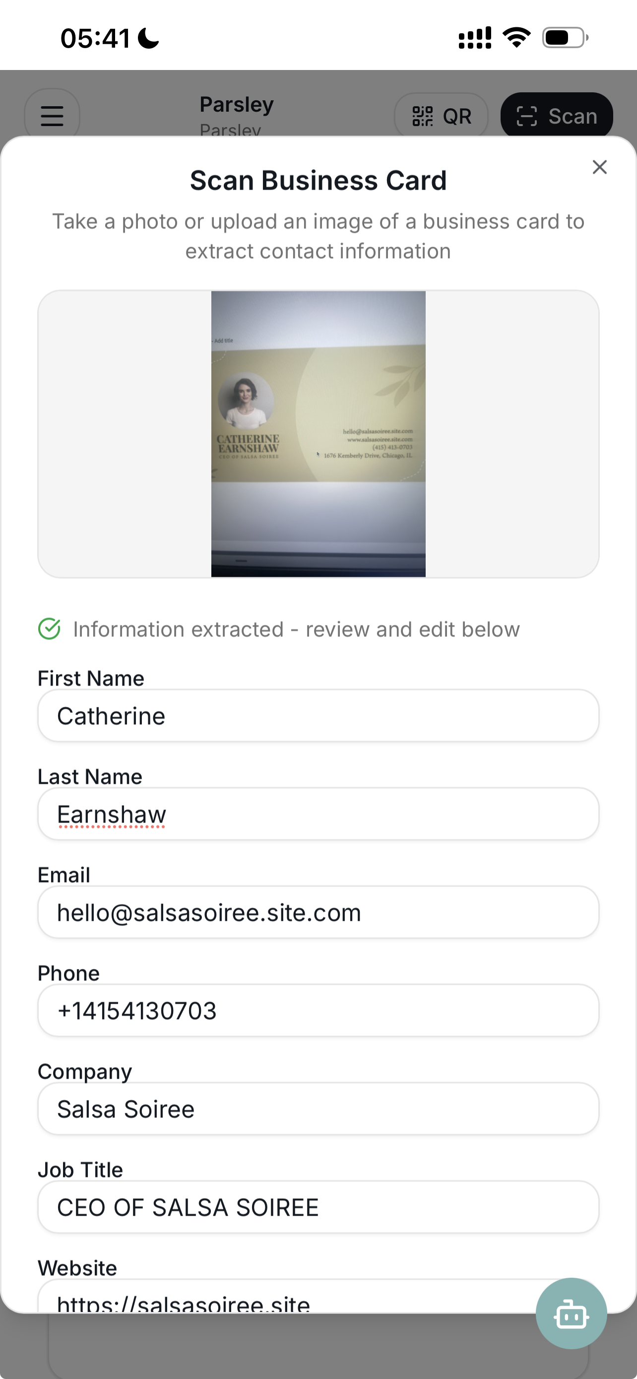 Parsley business card scanner showing extracted contact details including name, email, phone, company, and job title